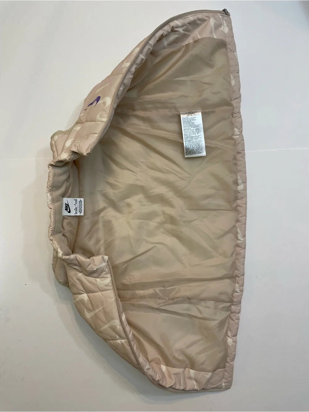 Nike Beige Quilted Puffer Vest - Swoosh Pattern + Purple Logo - Girls Medium (6)